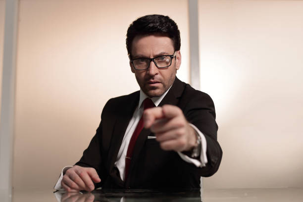 istock close up.confident businessman pointing at you 1001766442