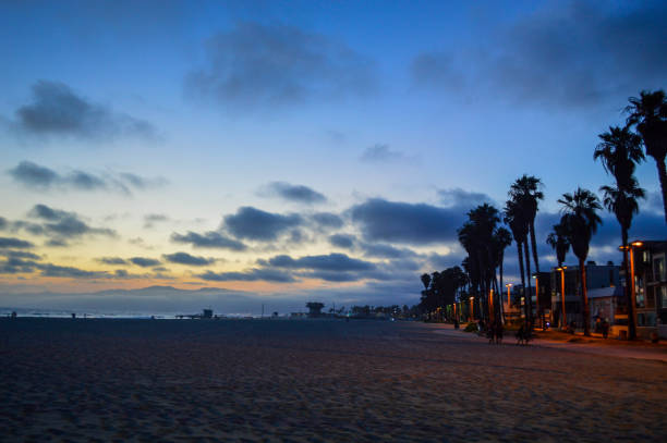 Waves crashing at sunset at Venice pier and beach in Venice/Marina del Rey, CA