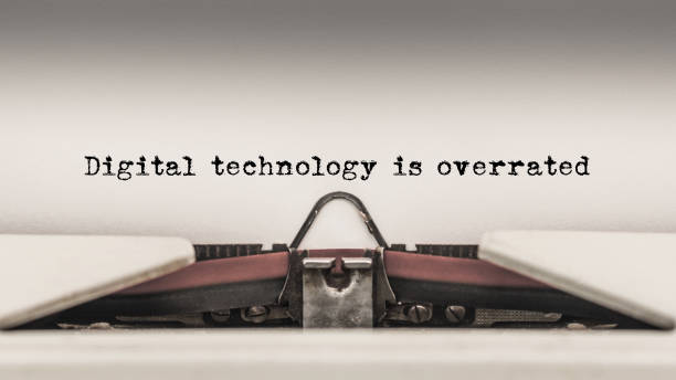 digital technology is overrated - typewriter sepia toned old nostalgia imagens e fotografias de stock