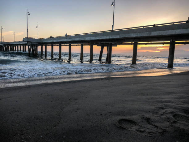 istock Summer sunset at Venice pier and beach in Marina del Rey, CA. 1001782240