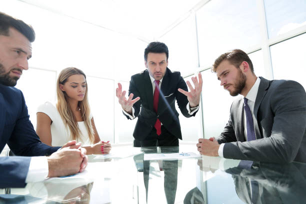 istock businessman makes a strict reprimand to the employee 1001790804