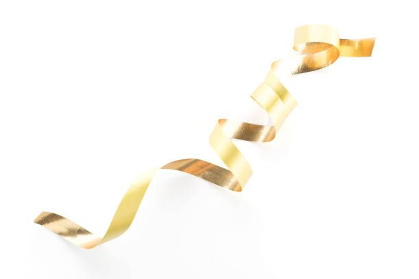 istock Golden ribbon roll isolated on white background 1001805112