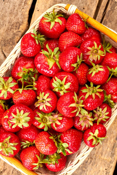 istock Plenty of fresh strawberry in basket. 1001805708