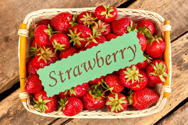 istock Basket full of garden strawberries. 1001805786