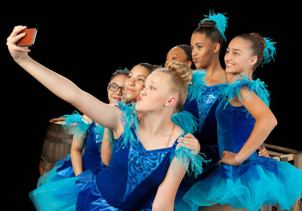istock Ballerina Friends Taking Selfies 1001811500