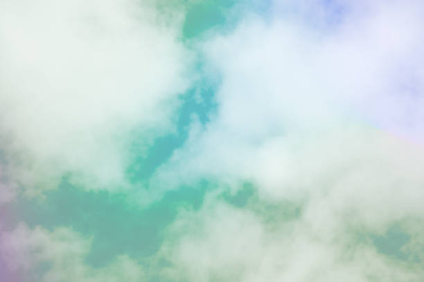 istock Sweet pastel colored cloud and sky with sun light, soft cloudy with gradient pastel color background. 1001814850