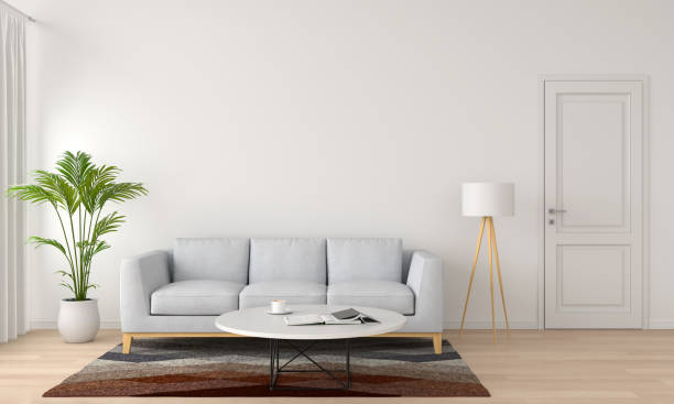istock grey sofa and lamp in white living room, 3D rendering 1001827626
