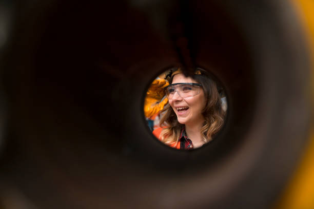 istock Young female working in factory 1001838454