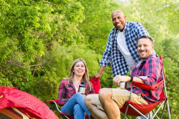 istock Group of friends laughing and talking. 1001848060