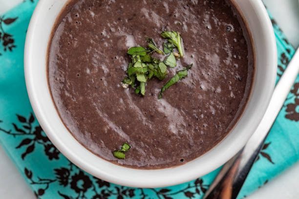 istock Black bean soup on a white bowl 1001848240