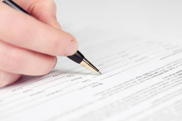 istock Business woman signing contract 1001853746