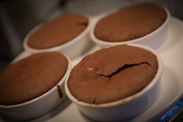 istock Four flourless chocolate cake ready to have toppings added 1001896956