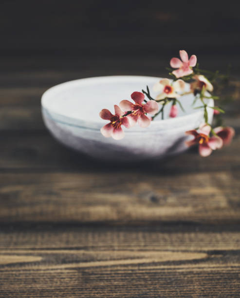 istock Rustic wooden bowl with blossoms 1001897544