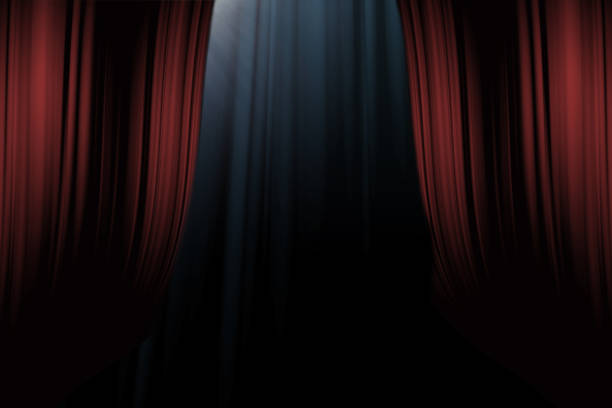 istock red curtains on stage in theater for drama background 1001928082