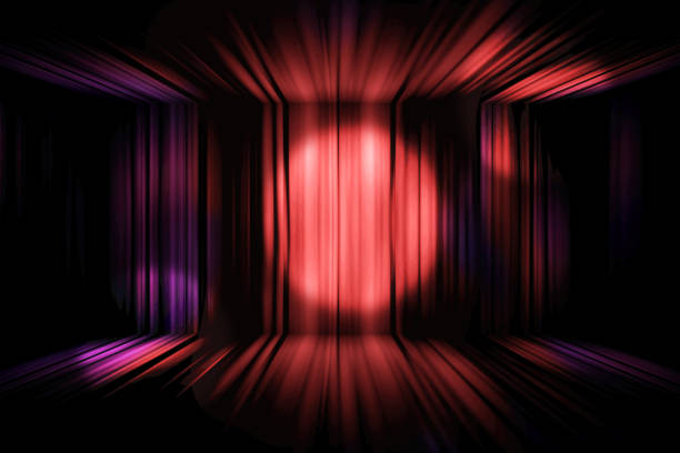 istock spot lighting in colorful curtain on stage theater 1001928110