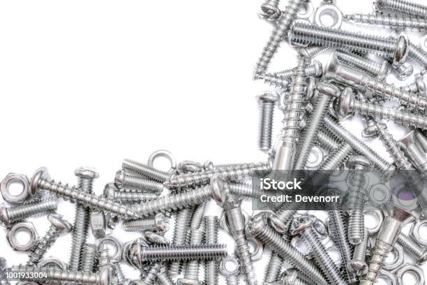 Big Collection Of Iron Screws Wood Screws And Bolts With A Free Rectangle For Text In The Upper Left Corner Stock Photo - Download Image Now