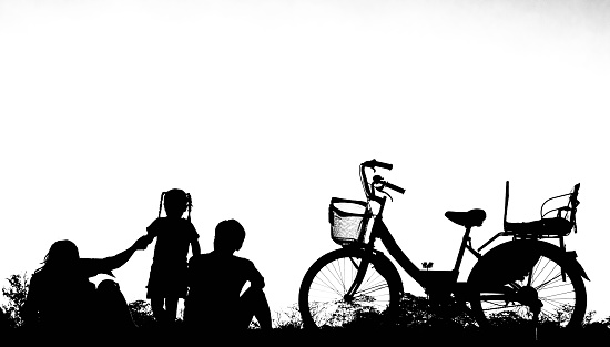 Silhouettes of happy families on white background. Concept of friendly family.