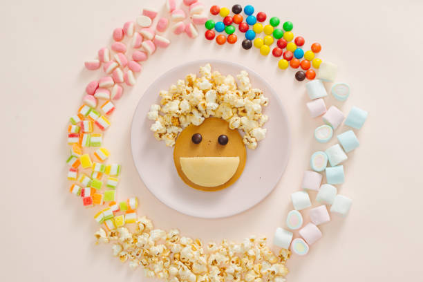 concept kid breakfast with pancake top view on white background