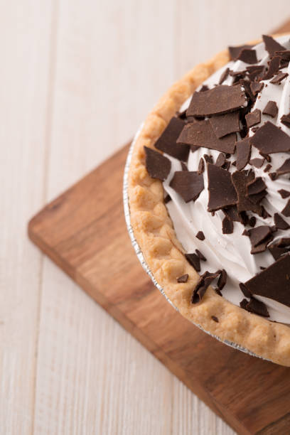 istock chocolate cream pie with chocolate shavings 1001964302