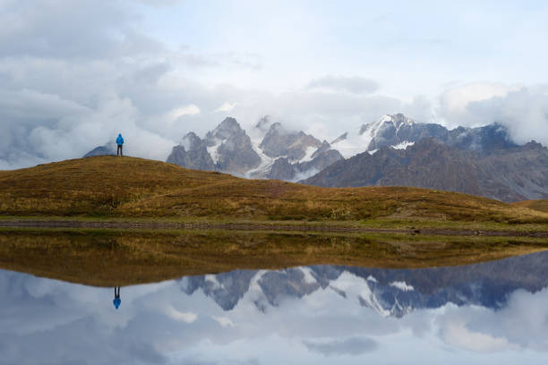 istock Tourist near a mountain lake 1001966660