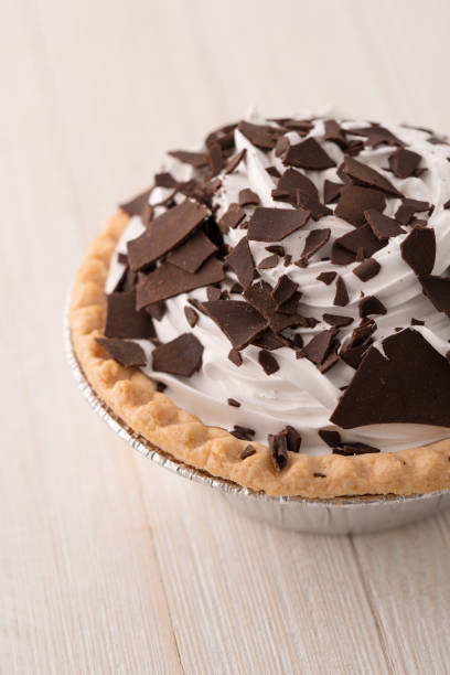 istock chocolate cream pie with chocolate shavings 1001967142
