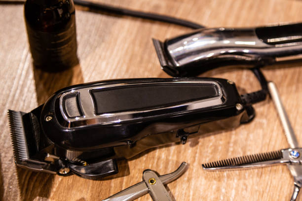 Closeup view of hairclipper and barber tools. Equipment of barbershop stock photo