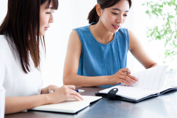 istock Two women who talk with each other. 1001989926