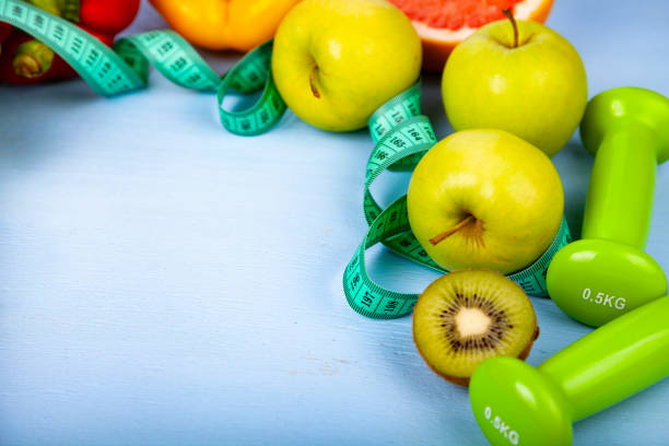 istock Food for  diet and dumbbells 1002000568