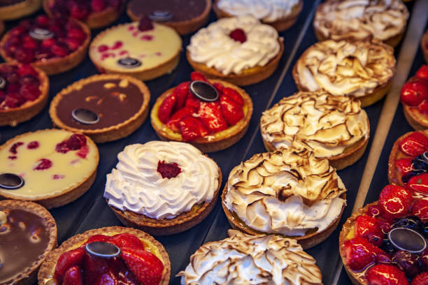 istock close up view of different cakes placed in rows 1002007750