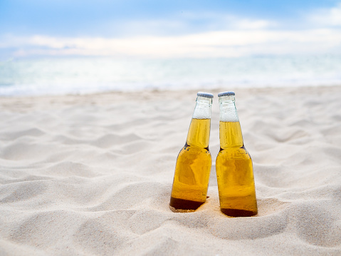 Bottles of Beer on the beach. Party, Friendship, Beer Concept.