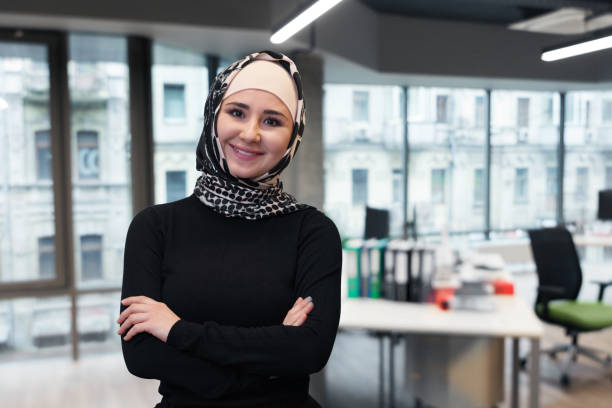 istock Muslim asian woman working in office 1002023380