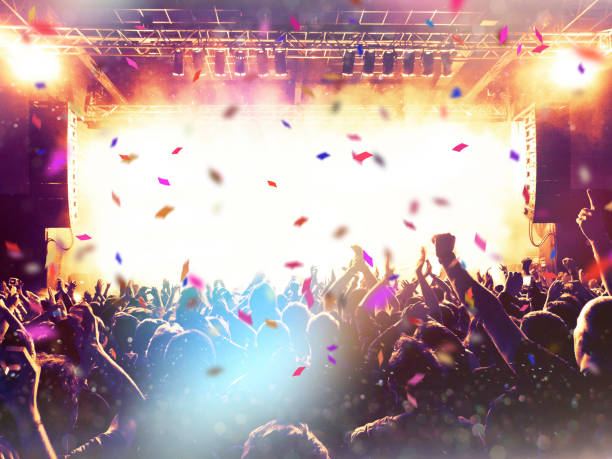 istock People in front of a stage 1002027416