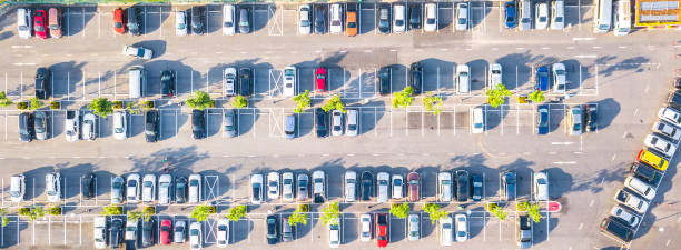 istock Aerial view  Parking lot and car 1002028068