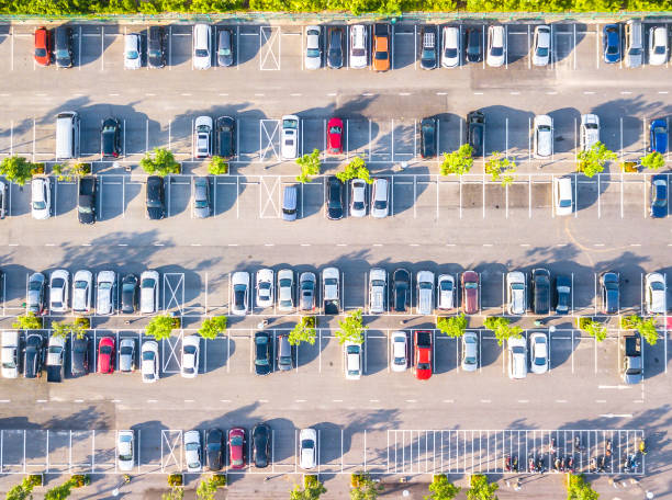 istock Aerial view  Parking lot and car 1002028070