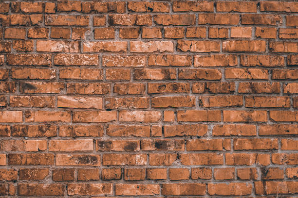 istock Abstract vintage wall texture. Old cracked brick wall 1002032528