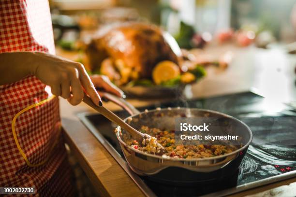 Unrecognizable Woman Preparing Side Dish For Thanksgiving Dinner Stock Photo - Download Image Now