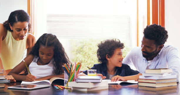 istock Helping the little ones with their homework 1002042326