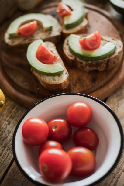 istock Avocado sandwich with cherry tomato, close-up 1002045646