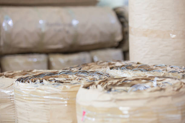 istock Rolls of bedsprings packed in cardboard 1002051042
