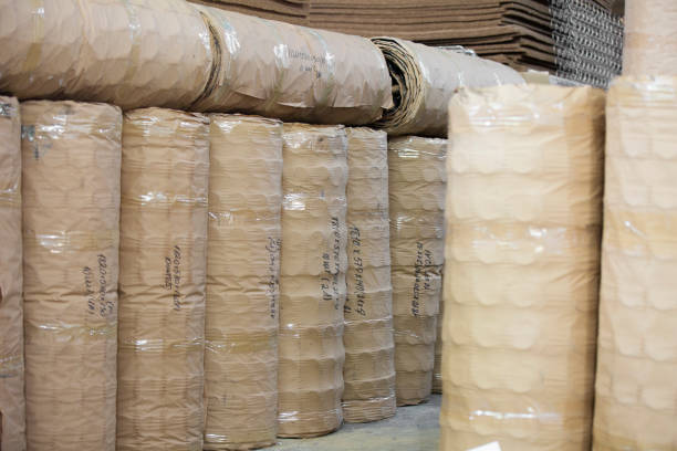 istock Rolls of bedsprings packed in cardboard 1002051124