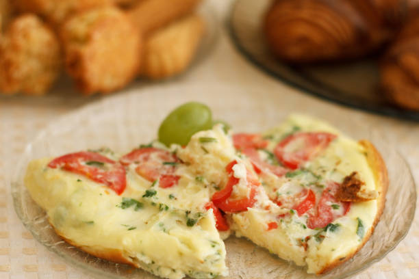istock Delicious magnificent omelet and pastries 1002051126