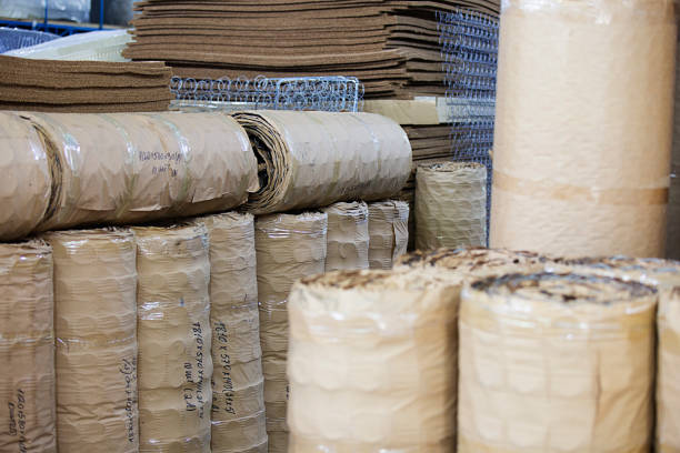 istock Rolls of bedsprings packed in cardboard 1002051144