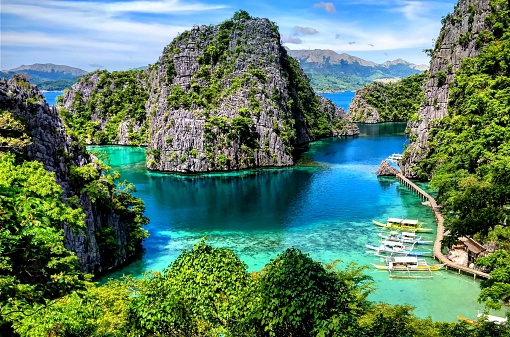 A shot taken from the above of the mountain of the lagoon and the Kayangan Lake in Philippines