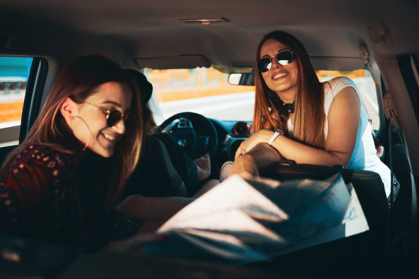 istock Three women on road trip. 1002055052