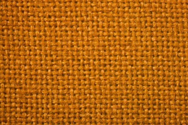 istock Background of orange-brown tweed fabric 1002061988