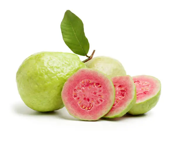 Close-up of halved guava isolated on white background
