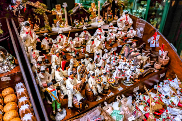 Within the heart of Naples’s historic centre, a photo of a shop stall on Via San Gregorio Armeno, selling creative nativity figurines in all variations. Photo taken on 24 October 2017.