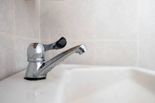 istock Close up faucet in the bathroom , save water concept 1002069352