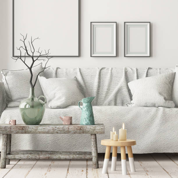 istock Mock up poster in an interior in Scandinavian style with a sofa. 3D rendering 1002072246