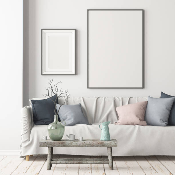 istock Mock up poster in an interior in Scandinavian style with a sofa. 3D rendering 1002072278